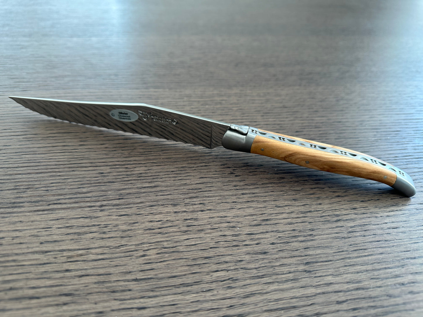 Laguiole en Aubrac Stainless Steel Bread Serrated Knife With Olivewood Handle, 7-in