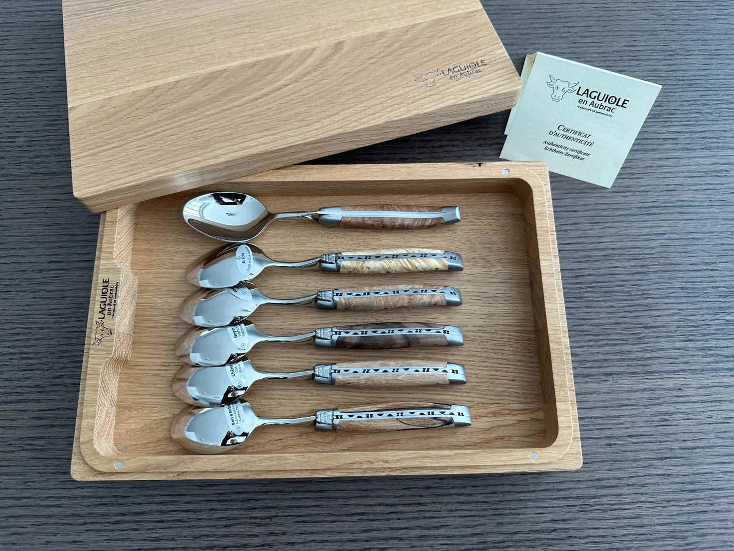 Laguiole en Aubrac Handcrafted 6-Piece Dessert Spoon Set with Mixed European Wood Handles