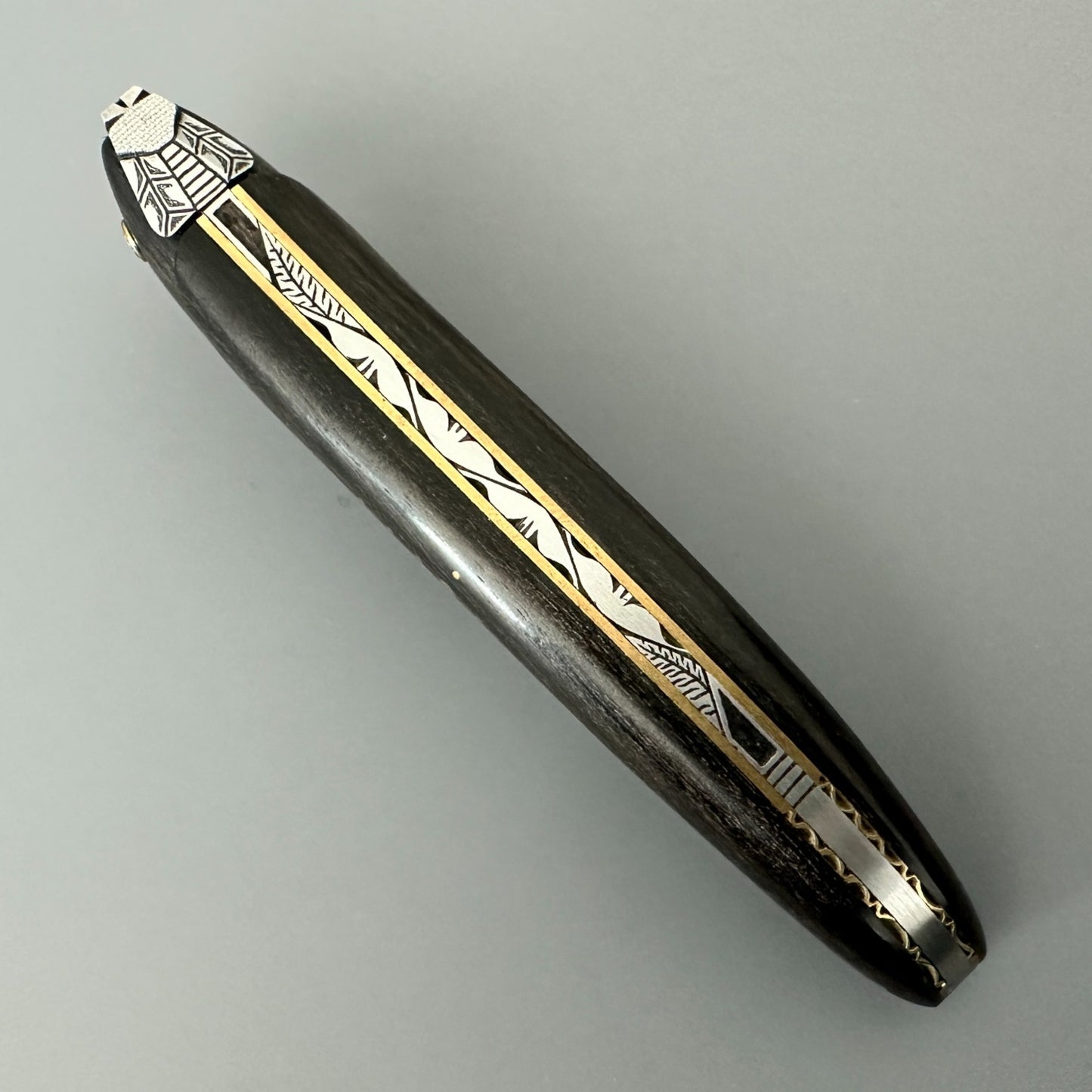 Laguiole en Aubrac Ebony & Brass Open Spine Cenital View