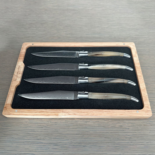 Laguiole en Aubrac 4-Piece Handcrafted French Steak Knife Set with Damascus Blades  | Solid Horn Handles