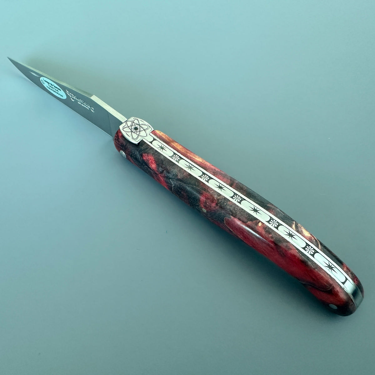 Laguiole en Aubrac Folding Knife Cosmos Big Bang Bee, Red Fire Elder Burl