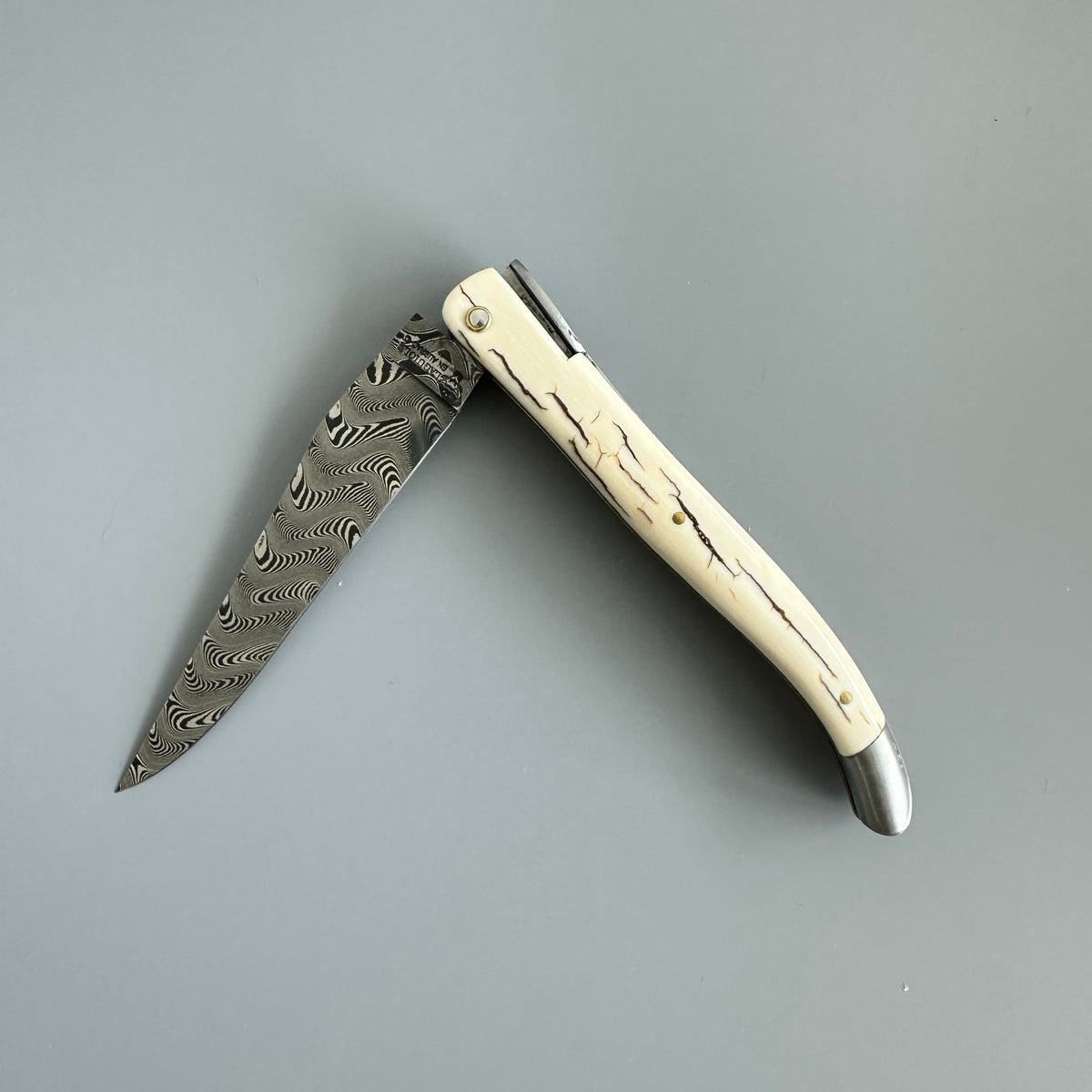 Laguiole en Aubrac — Origine Tour Eiffel Limited Edition Folding Knife | Ivory Crust Handle, Damascus Blade