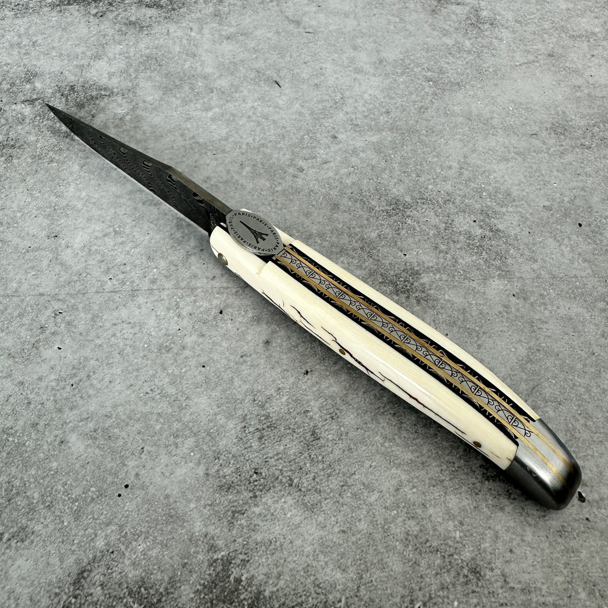 Laguiole en Aubrac — Origine Tour Eiffel Limited Edition Folding Knife | Ivory Crust Handle, Damascus Blade