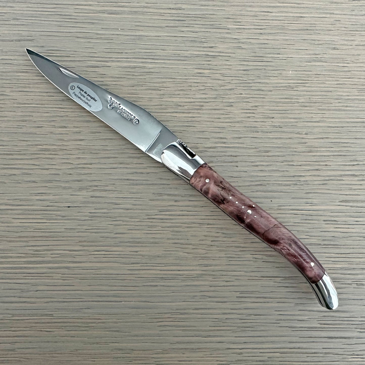 Laguiole en Aubrac Handcarved Plates Multipurpose Knife with Stabilized Purple Poplar Burl, 4.75-Inches