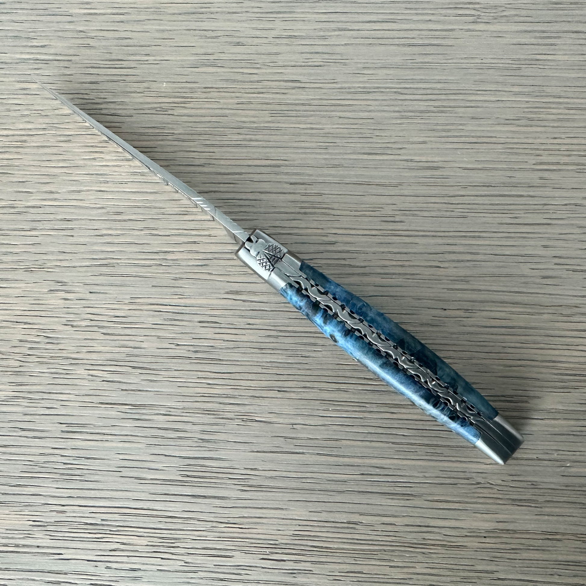 Laguiole en Aubrac Handcarved Plates Multipurpose Knife with Stabilized Blue Poplar Burl Handle, 4.75-Inches