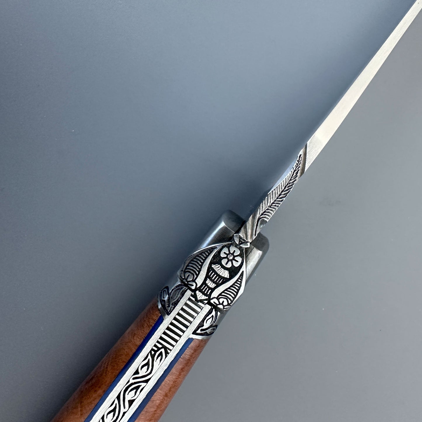 Close view of Gothic Bee from a Laguiole en Aubrac Aubrac Wood Belle Piece Knife