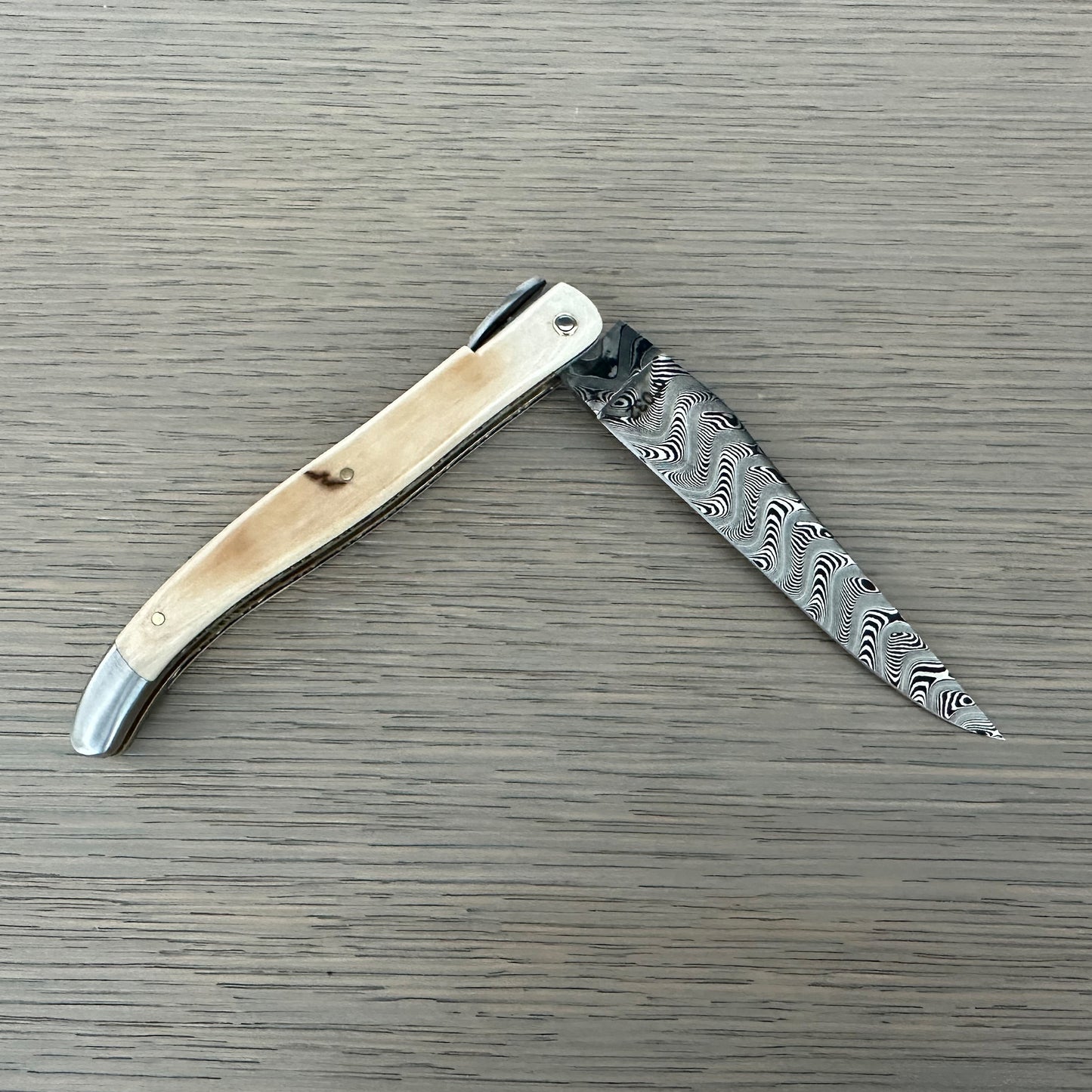 Laguiole en Aubrac — Origine Tour Eiffel Limited Edition Folding Knife | Ivory Crust Handle, Damascus Blade