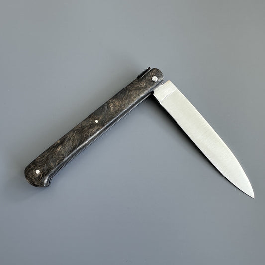 Laguiole Droit knife open and reversed, highlighting the straight blade profile and lockback mechanism at the spine