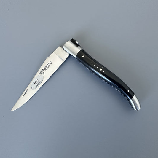 Laguiole en Aubrac folding knife with ebony handle, shown open, with blade ebony wood handle