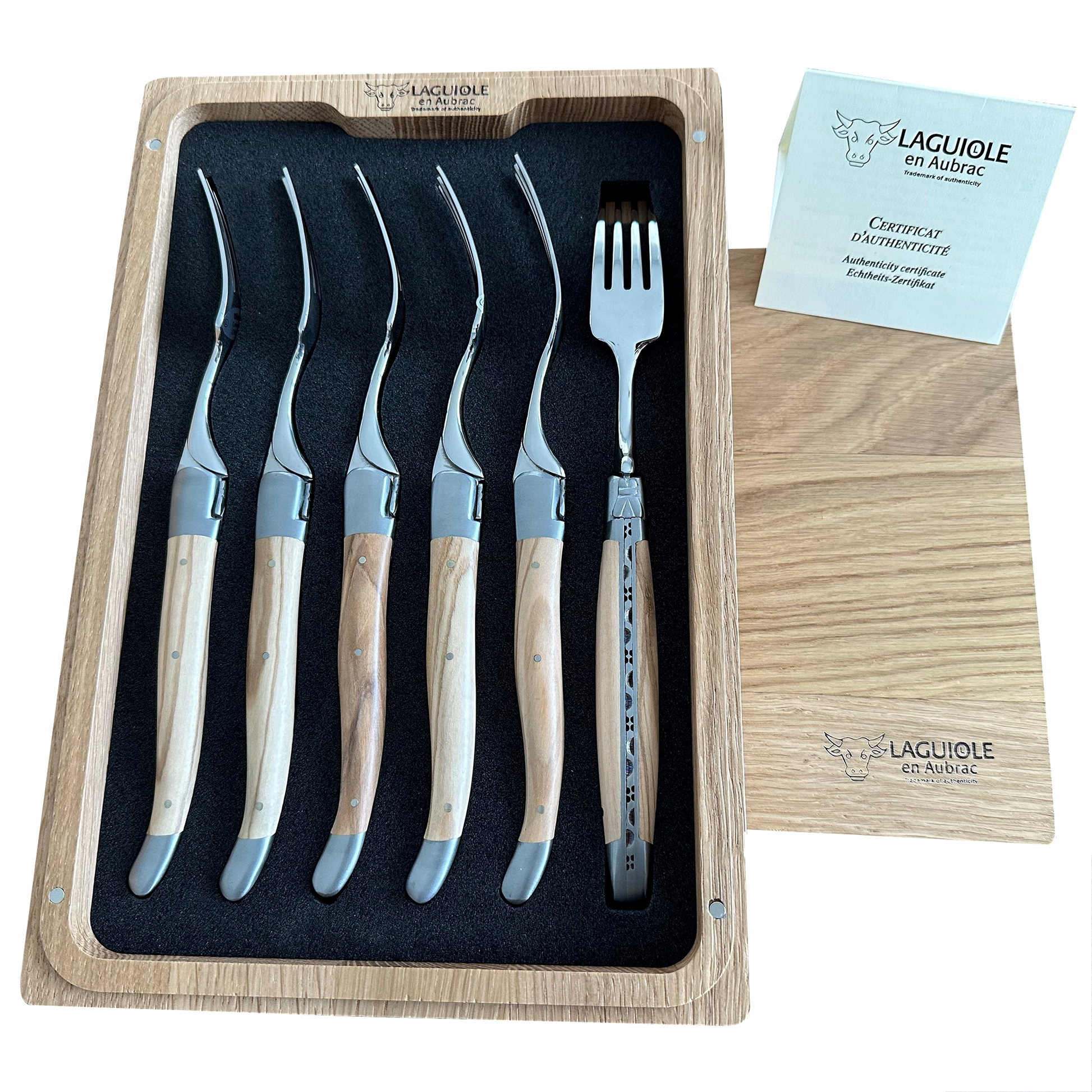 Set of Laguiole en Aubrac cutlery in a wooden box with a certificate of authenticity.