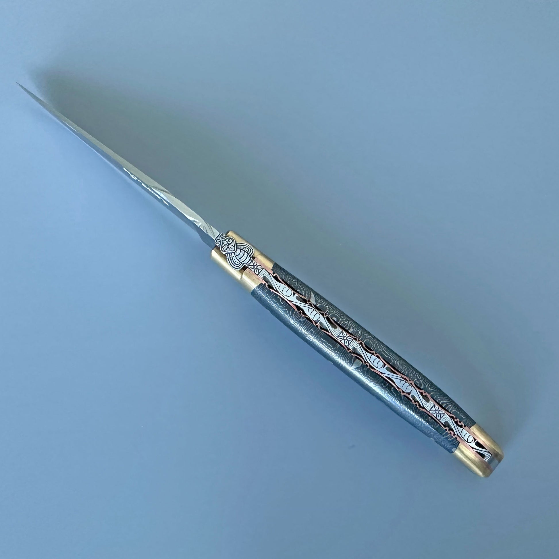 Laguiole en Aubrac Belle Pièce pocket knife, tricolor black, brass and silver handle