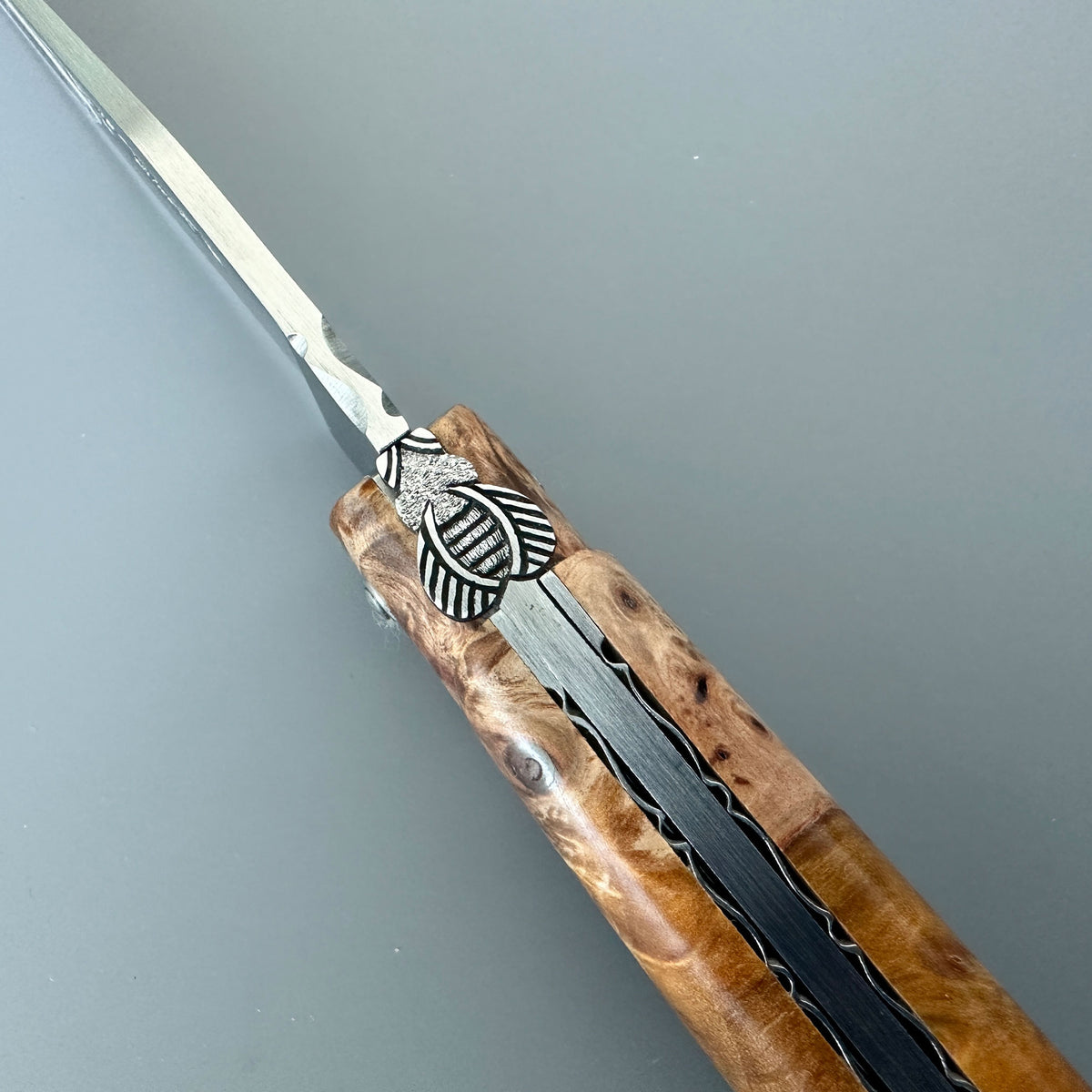 Laguiole Belle Piece Chestnut Wood Zoom detail of the bee and spine