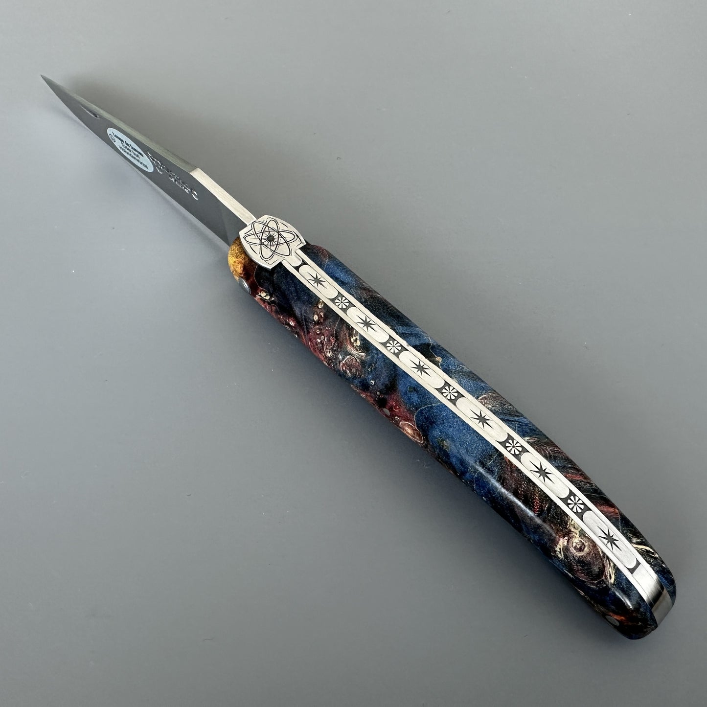 Laguiole en Aubrac Folding Knife Cosmos Big Bang Bee, Dark Fire Elder Burl, 4.8"