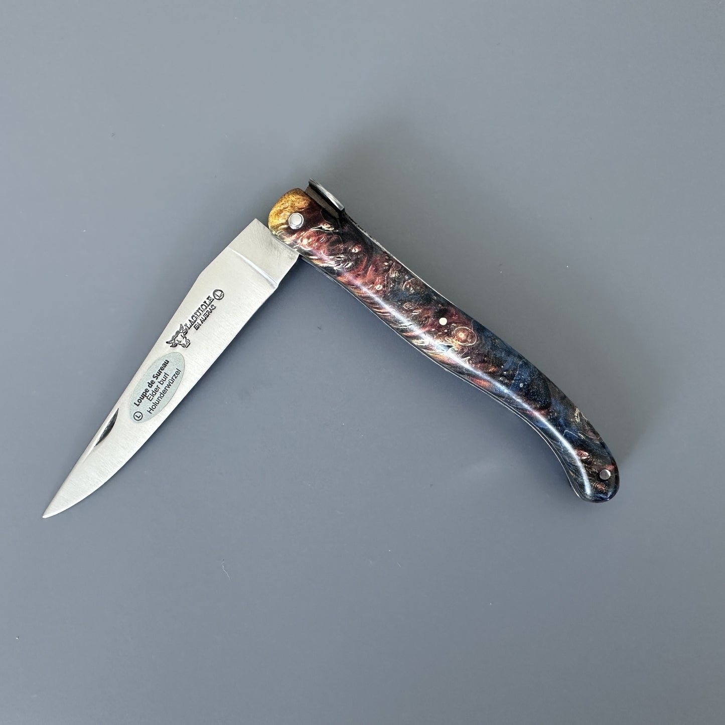 Laguiole en Aubrac Folding Knife Cosmos Big Bang Bee, Dark Fire Elder Burl, 4.8"