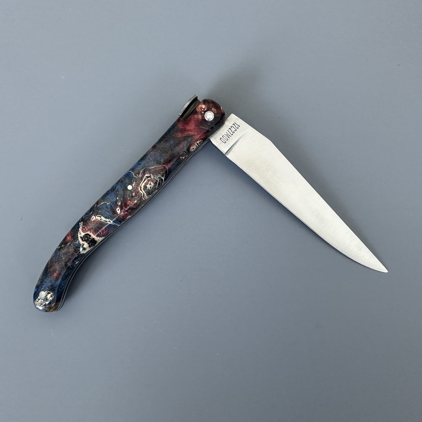 Laguiole en Aubrac Folding Knife Cosmos Big Bang Bee, Dark Fire Elder Burl, 4.8"
