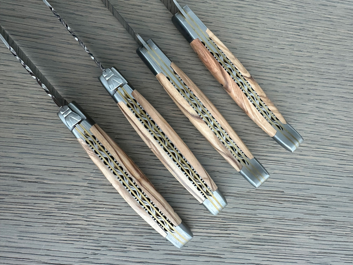 Laguiole en Aubrac Luxury Handcrafted Stainless Steel & Brass Double Plate 4-Piece Steak Knife Set with Olivewood Handles