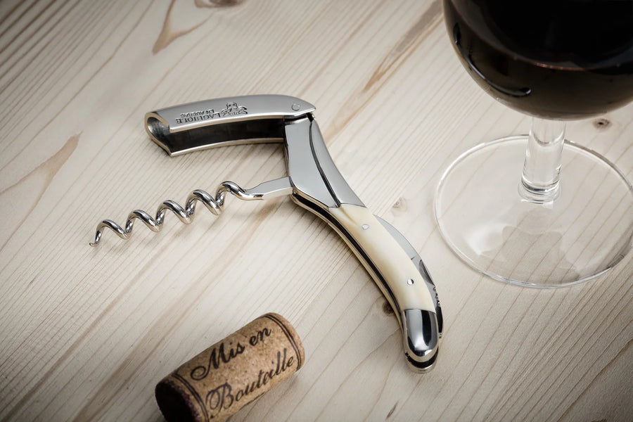 Laguiole en Aubrac sommelier corkscrew with a wine glass and cork