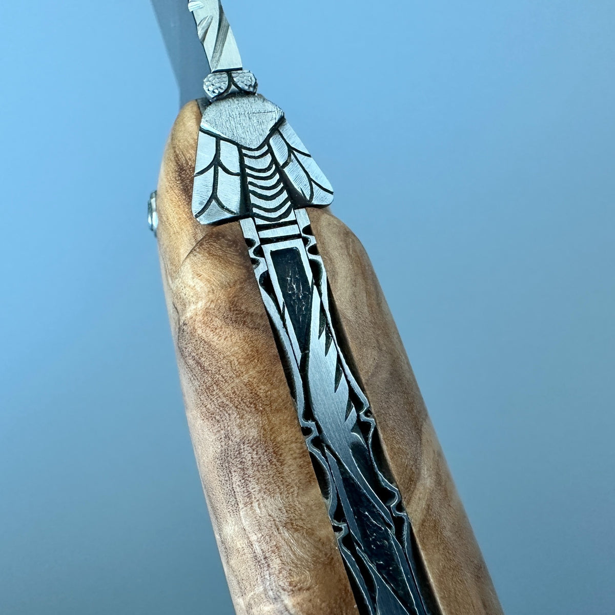 Laguiole Belle Piece Olive wood close up view of Bee and spine