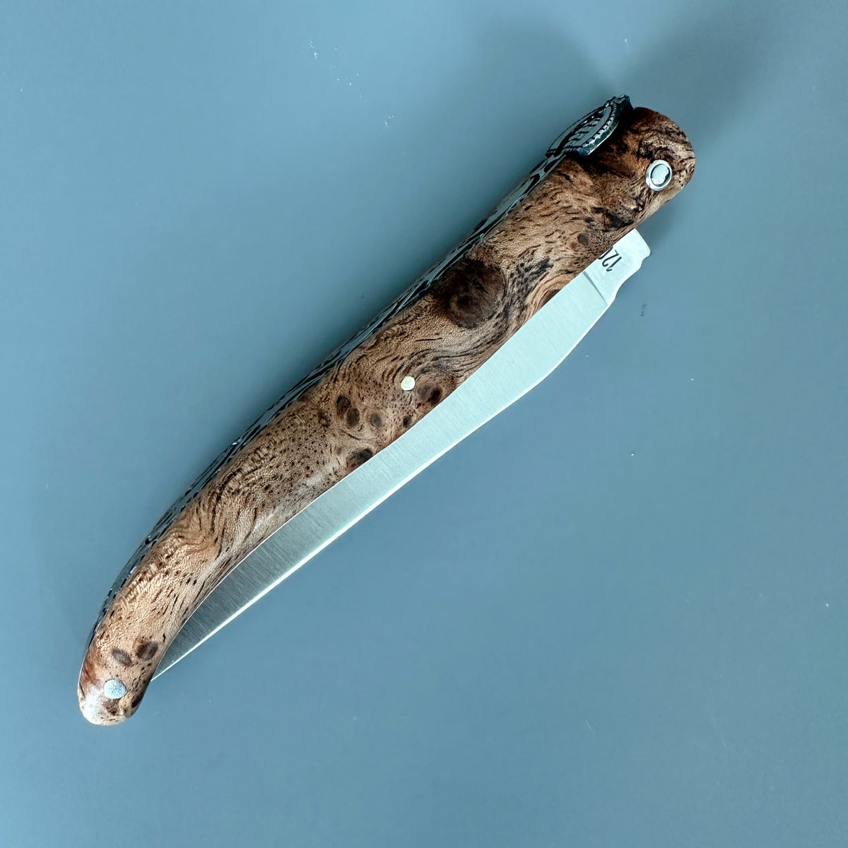 Laguiole en Aubrac Closed Folding knife Belle piece collection with Albizia wood handle.
