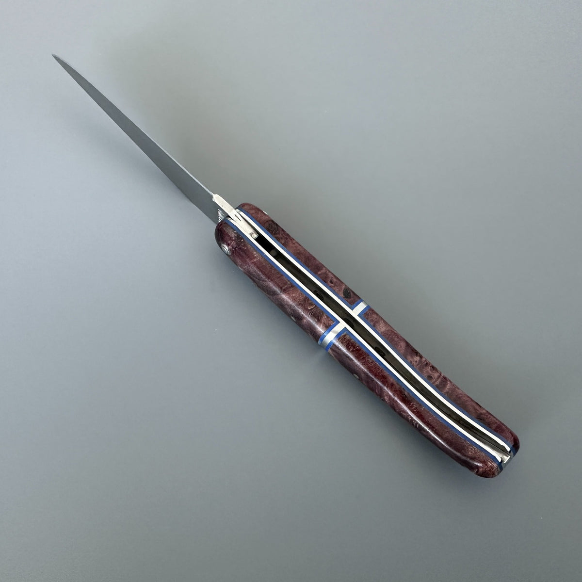 Laguiole en Aubrac inner spine showing central bolster and wine poplar handle