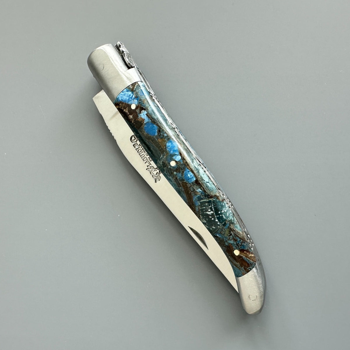 Laguiole en Aubrac Folding Knife with Blue Fusion Mammoth Ivory handle handle fully closed.
