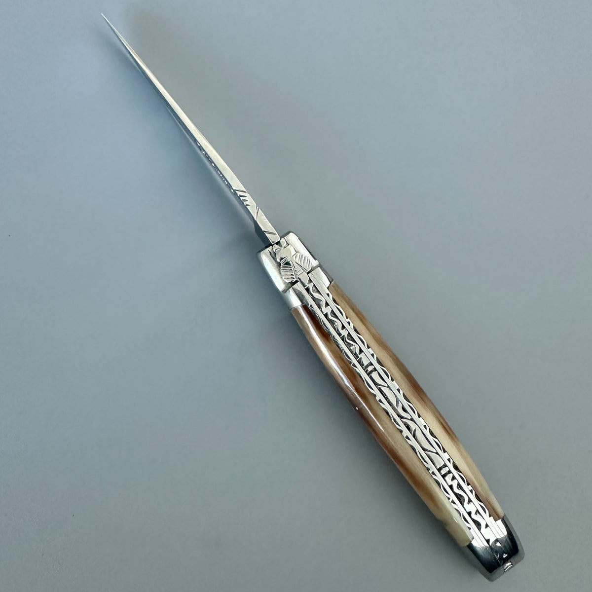 Laguiole en Aubrac Double-Plated Folding Knife — Solid Horn Handle, Blonde