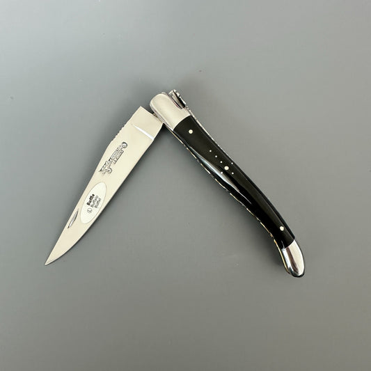 Laguiole en Aubrac double-plated pocket knife with a buffalo horn handle partially open