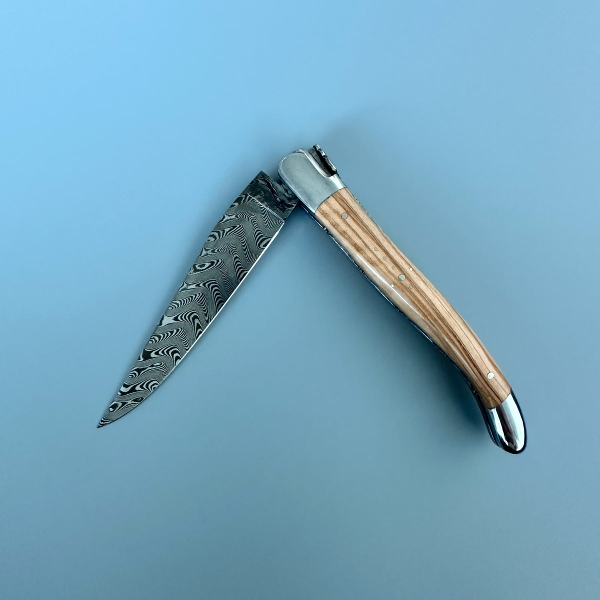 Laguiole en Aubrac Balbach Damascus Double-Plated Knife – Olive Wood, Polished Bolsters