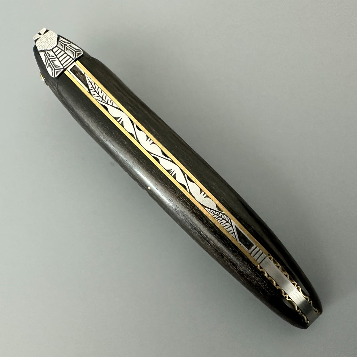 Laguiole en Aubrac Ebony & Brass Open Spine Cenital View