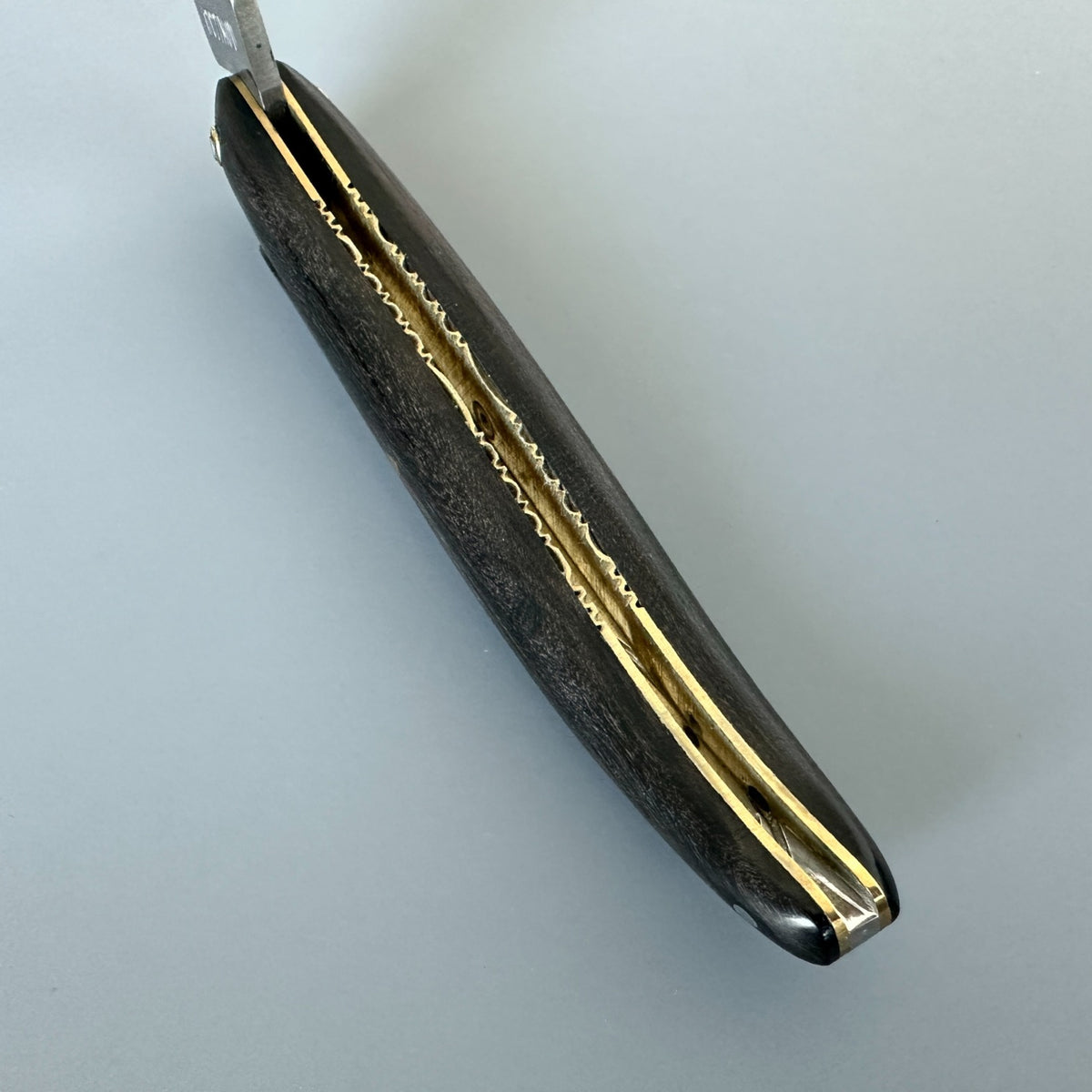 Laguiole en Aubrac Ebony & Brass – Handle Interior