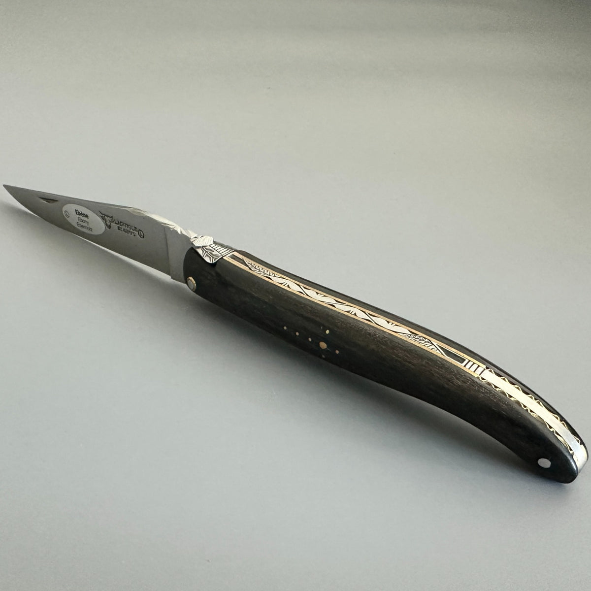 Laguiole en Aubrac Ebony & Brass Open Logo Side