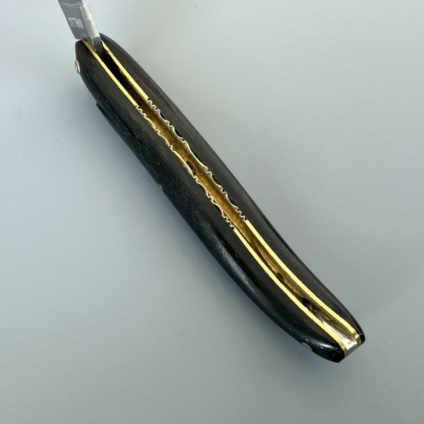 Laguiole en Aubrac Ebony & Brass Folding Knife – Handle Interior Detail