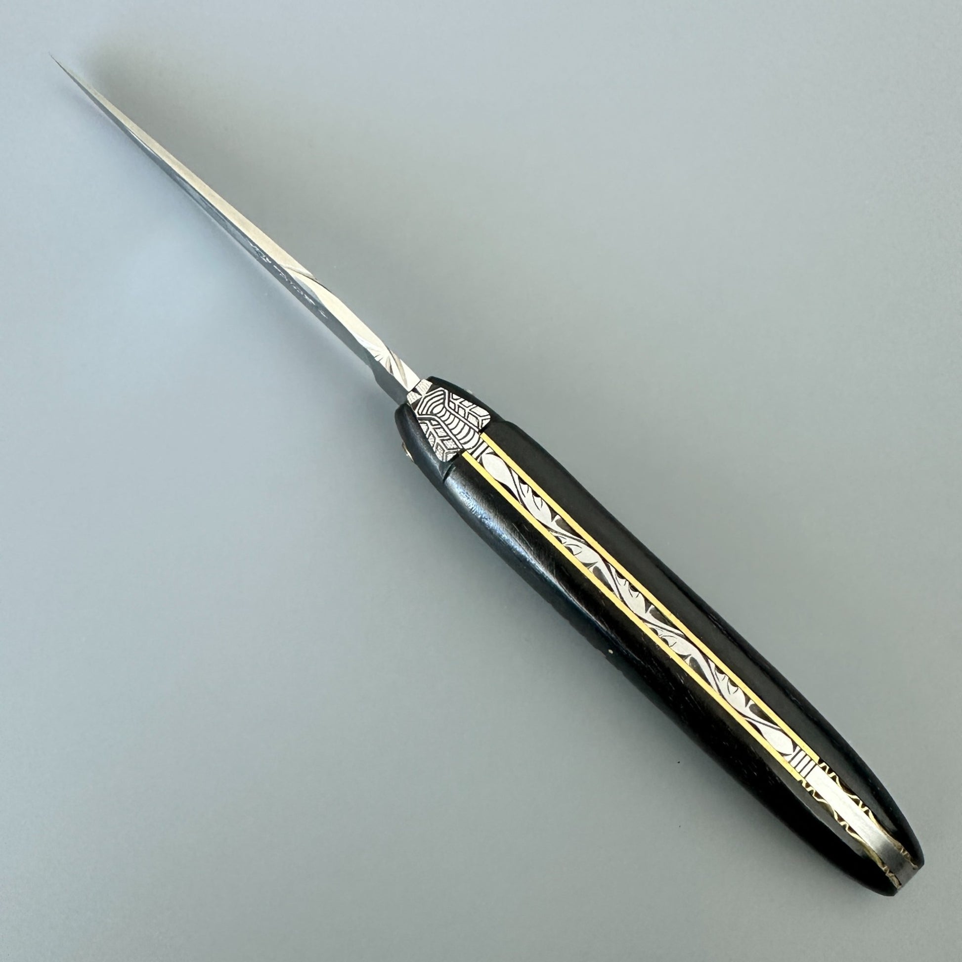 Laguiole en Aubrac Ebony & Brass Folding Knife – Angled Open Spine