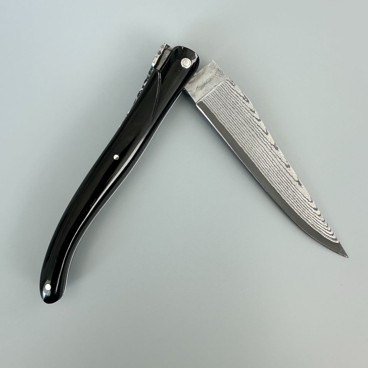 Laguiole en Aubrac Folding Knife, Full Buffalo Horn Handle with Damascus Blade