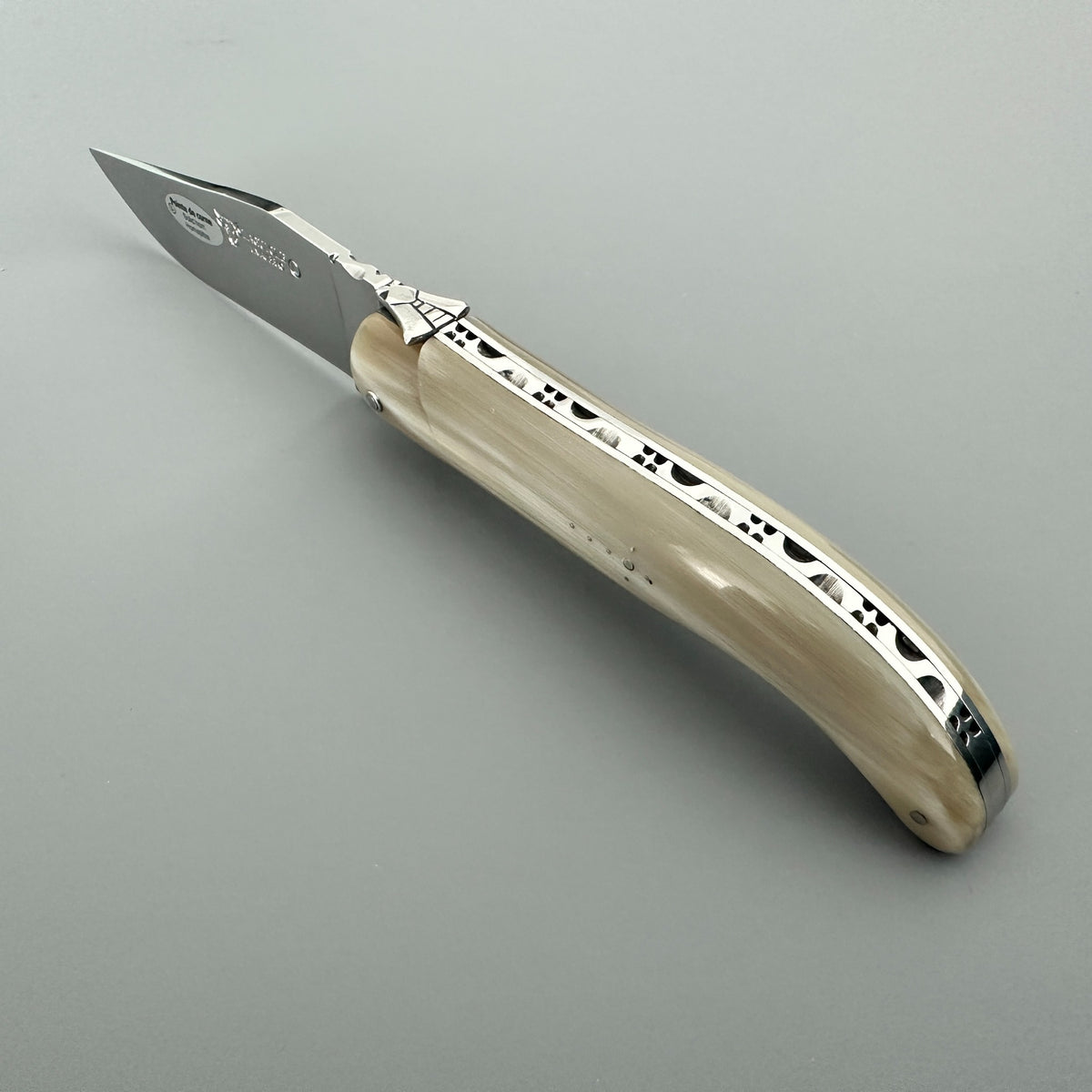 Laguiole en Aubrac Hunting Knife with Blonde Solid Horn fully opened.