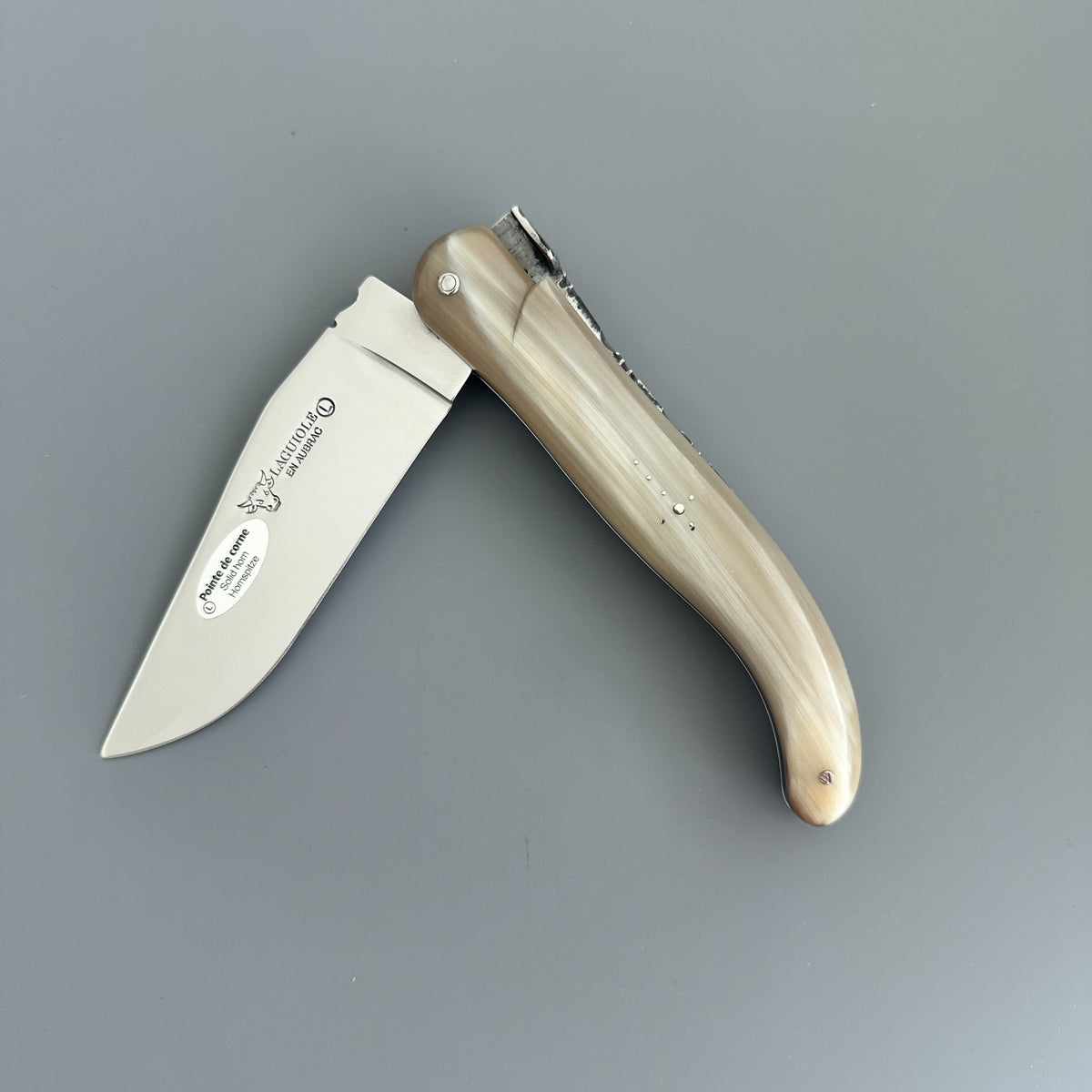 Laguiole en Aubrac Hunting Knife with Blonde Solid Horn  partially opened.