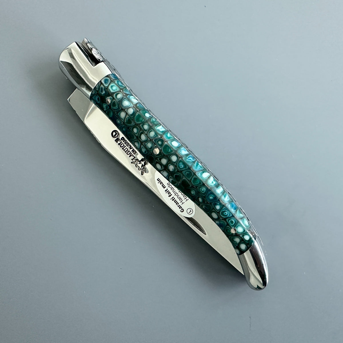 Laguiole en Aubrac Hand Carved Paperwaves Folding Knife, Blue