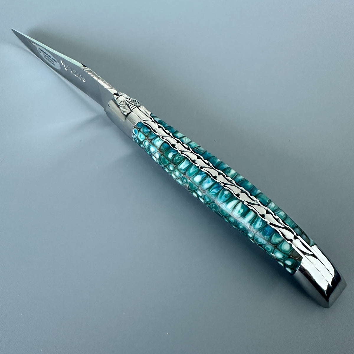 Laguiole en Aubrac Hand Carved Paperwaves Folding Knife, Blue