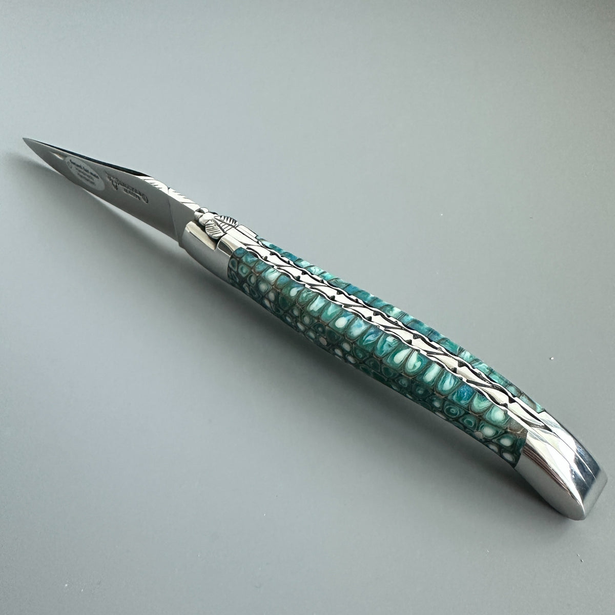 Laguiole en Aubrac Hand Carved Paperwaves Folding Knife, Blue