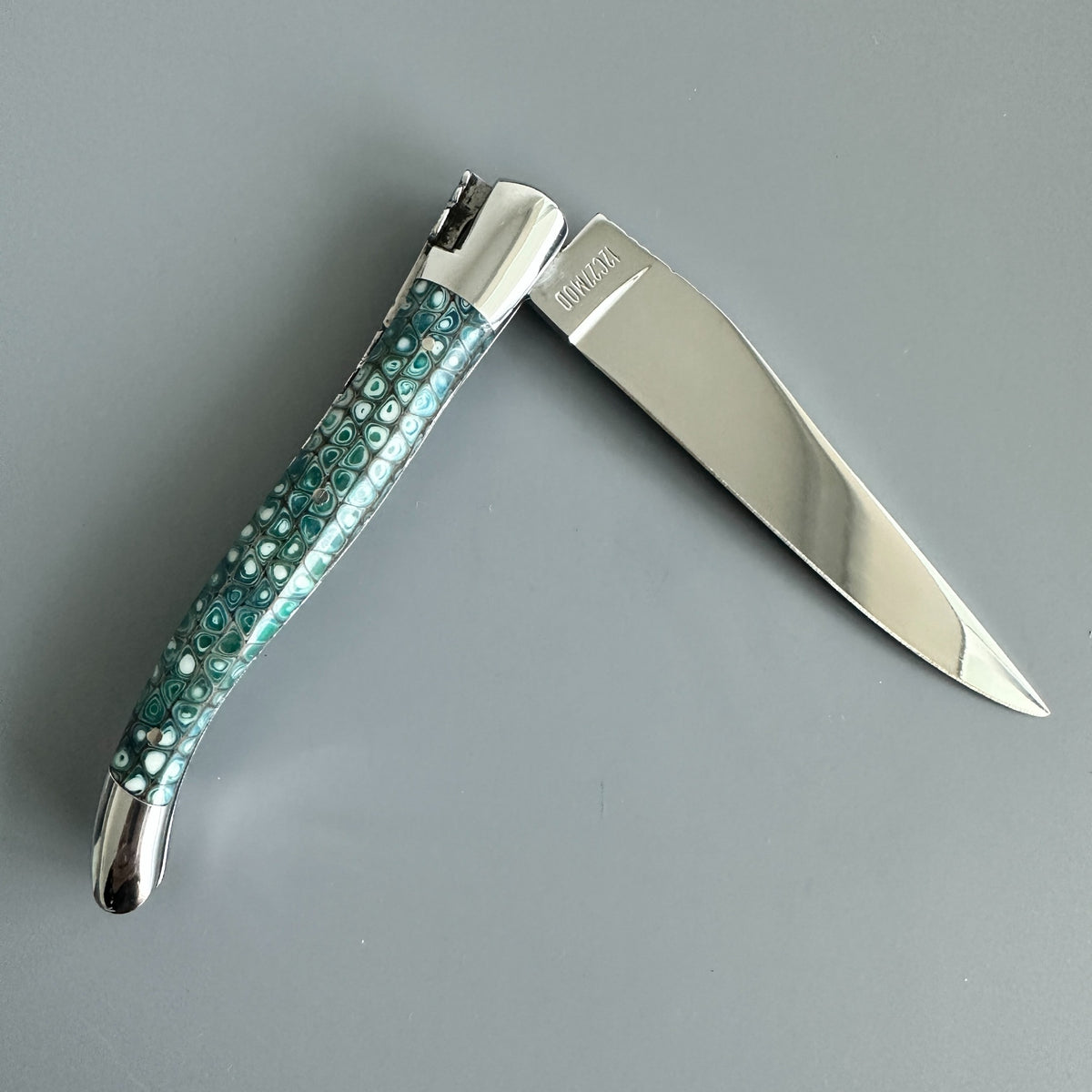 Laguiole en Aubrac Hand Carved Paperwaves Folding Knife, Blue
